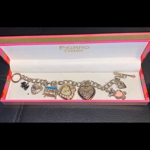 Figaro couture charm bracelet with watch. With its original box. 7 charms